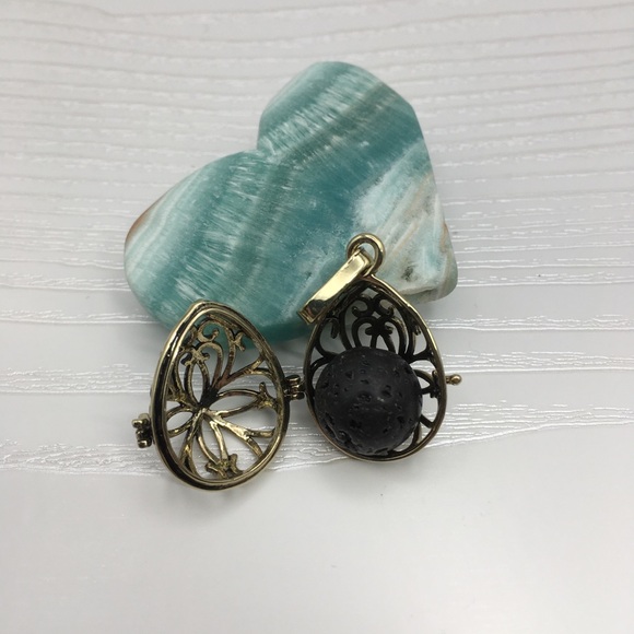 Pattern Egg Shaped Aromatherapy Brass tone Locket.  Lava stone included. - Picture 2 of 2